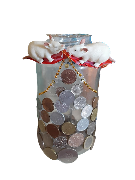 glass jar covered in coins, gold beads and two mice kissing at the top